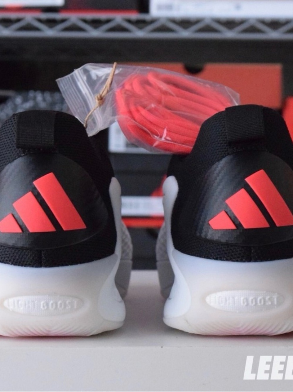 adidas Kids Black Sneakers with Red Logo Accents
